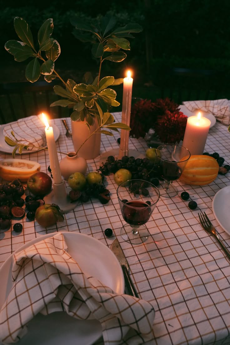 Candlelit dinner at a long table